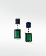 Lark & Berry's London Bridge Drop Earrings with emerald-cut green and square-cut blue gems set in white gold.