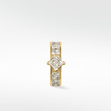 Front view of the Modernist Princess Cut Diamond Hoop in 14k yellow gold with channel-set diamonds.