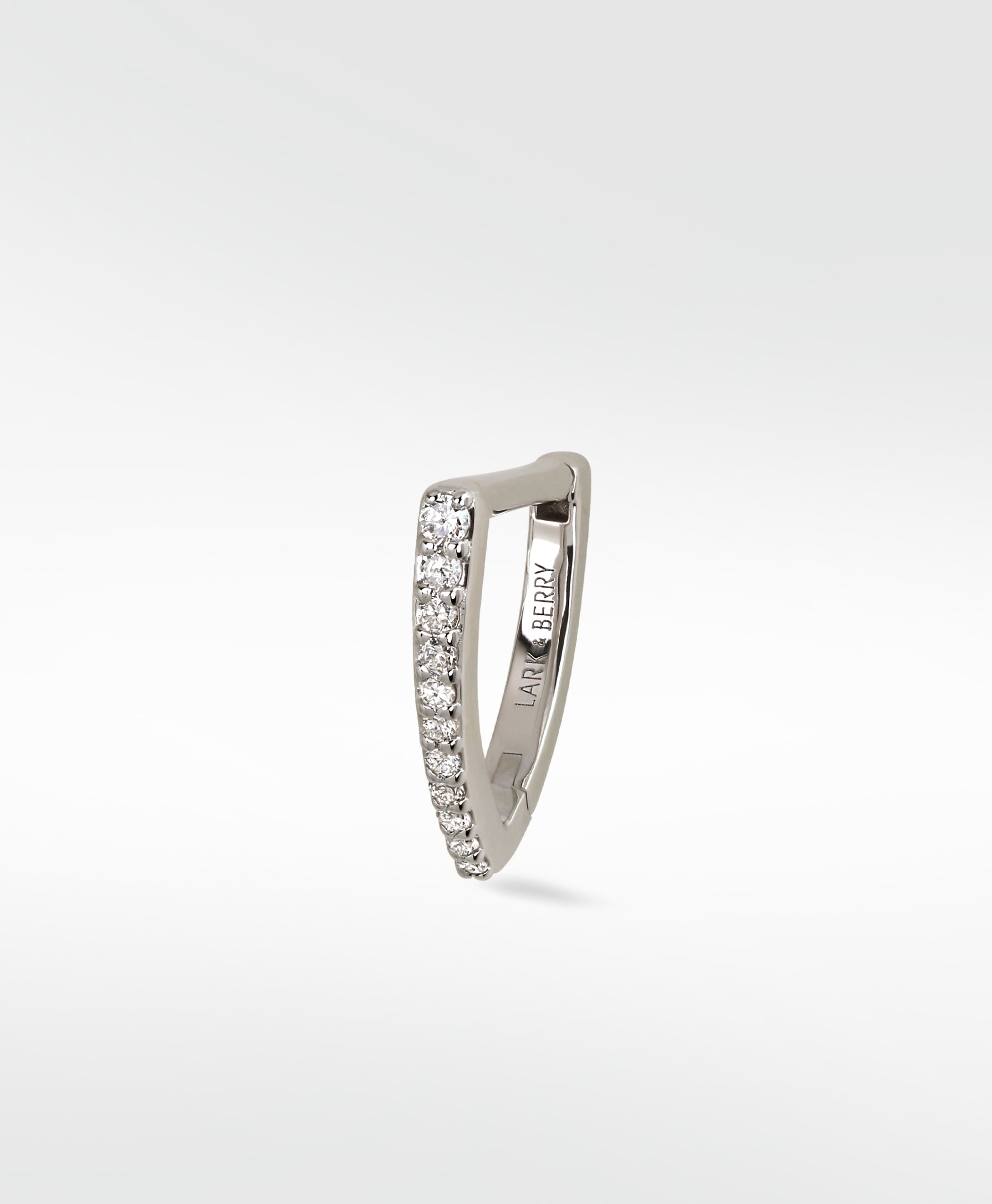Lark & Berry Modernist V-shaped hoop earring in white gold, featuring a line of graduating pavé diamonds.